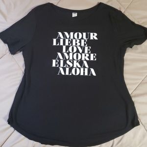 A black shirt that says love in different language